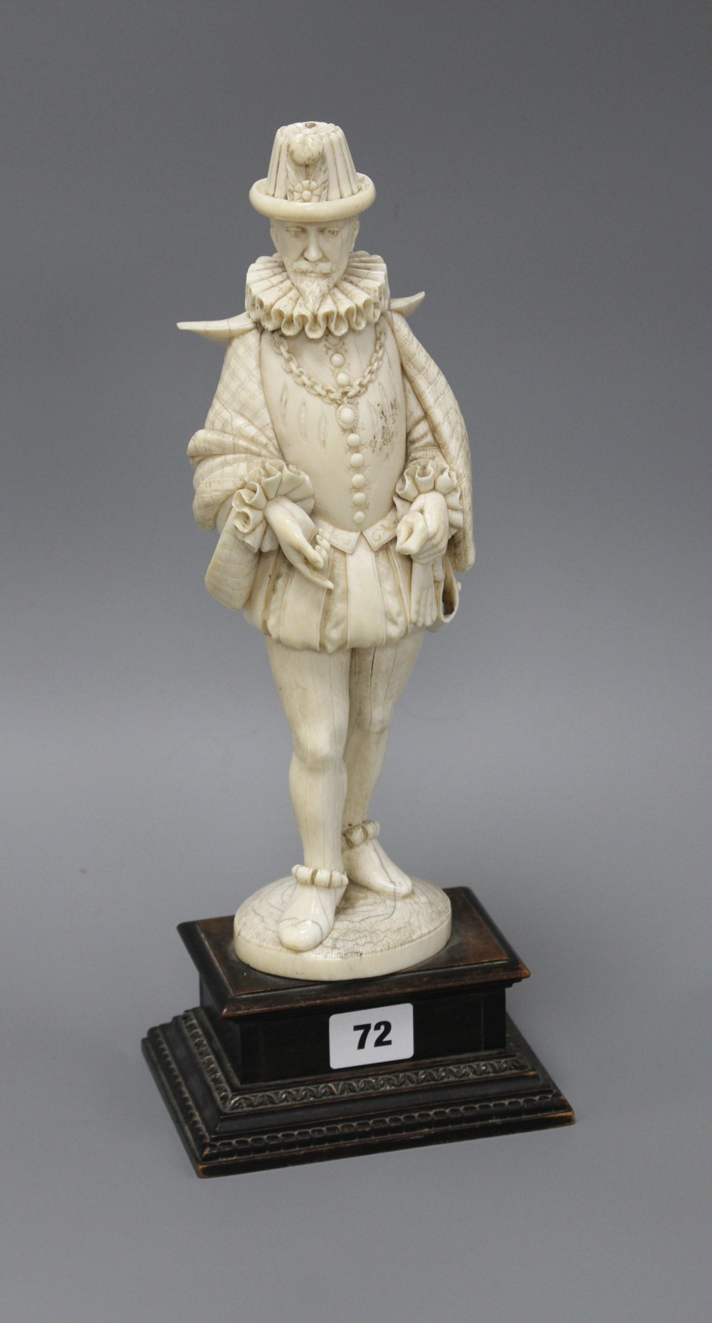 A 19th century Dieppe carved ivory figure of a 17th century gentleman, standing and wearing a ruff colour, height 30cm,